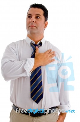 Man Giving Respect By Salute Stock Photo