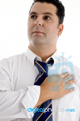 Man Giving Respect By Salute Stock Photo