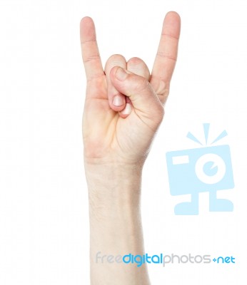 Man Hand Showing Rock And Roll Sign Stock Photo