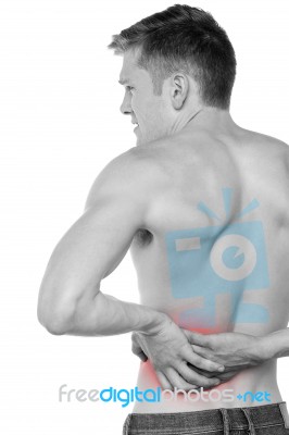 Man Having Lower Back Pain Stock Photo