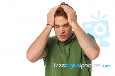 Man Having Severe Headache Stock Photo