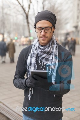 Man Holdin I-pad Tablet Computer On Street Stock Photo