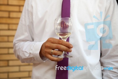 Man Holding A Glass Of  Wine Stock Photo