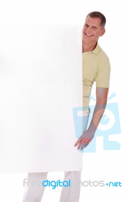 Man Holding Blank White Board Stock Photo