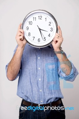 Man Holding Clock, Show Time To You Stock Photo