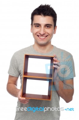 Man Holding Frame Stock Photo