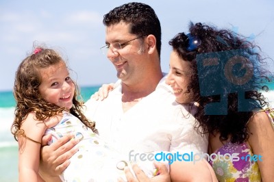 Man Holding His Daughter Stock Photo