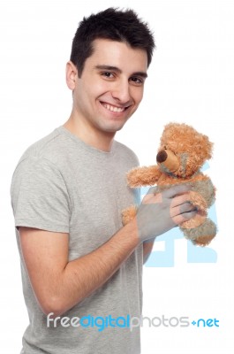 Man Holding Teddy Bear Stock Photo