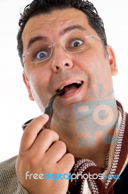 Man Holding Tobacco Pipe Stock Photo