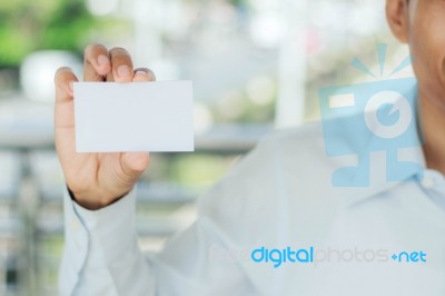 Man Holding White Card Stock Photo