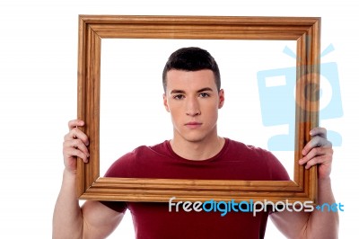 Man Holding Wooden Picture Frame Stock Photo