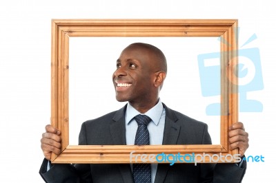 Man Holding Wooden Picture Frame Stock Photo