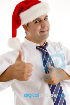 Man In Santa Hat Cheering Up Stock Photo