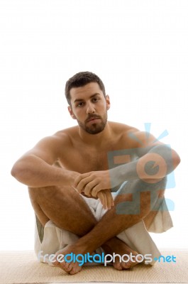 Man In Sitting Pose Stock Photo