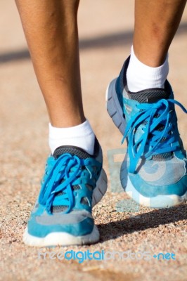 Man In Sportswear Running In A Park Stock Photo