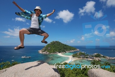 Man Jumping In Outdoors Stock Photo