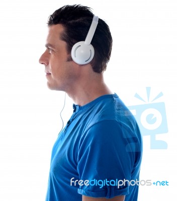 Man Listening Music With Headphones Stock Photo