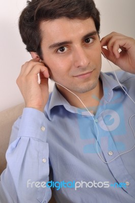 Man Listening To Music Stock Photo