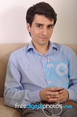 Man Listening To Music Stock Photo