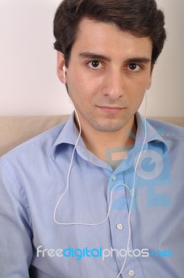 Man Listening To Music Stock Photo