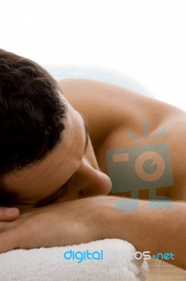 Man Lying Down For Spa Treatment Stock Photo