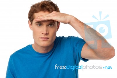 Man Observing Something Closely Stock Photo