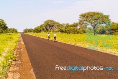 Man On Bicycle Stock Photo