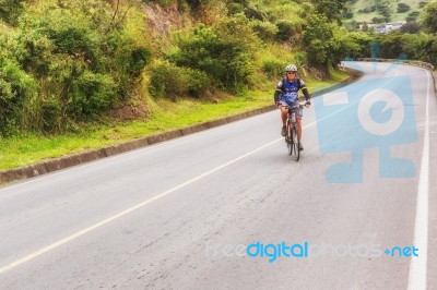 Man, On The Bicycle On The Road In Nicaragua Mountains Stock Photo