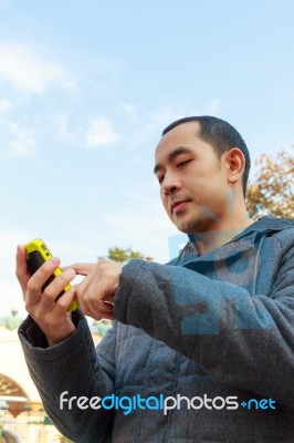 Man Play Mobile Phone Stock Photo