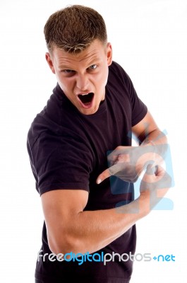 Man Pointing His Muscles Stock Photo