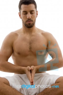 Man Practicing Yoga Stock Photo