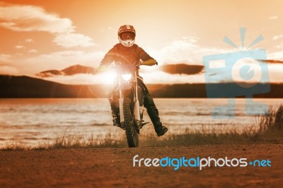 Man Riding Enduro Motorcycle In Motor Cross Track Use For People Activities And Leisure ,traveling Extreme Motor Sport Stock Photo