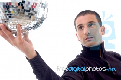 Man Showing Disco Shiny Ball Stock Photo