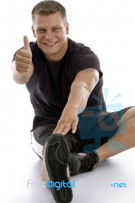 Man Showing Good Luck Sign Stock Photo