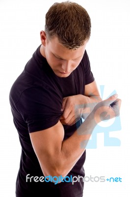 Man Showing His Muscles Stock Photo