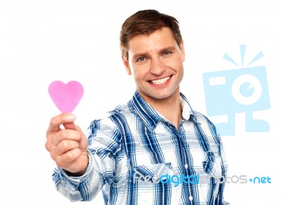 Man Showing Pink Paper Heart Stock Photo