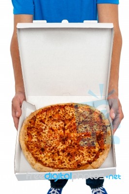 Man Showing Pizza Box Stock Photo