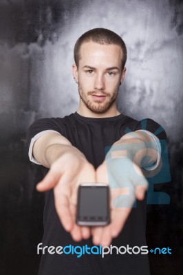 Man Showing Smartphone Stock Photo