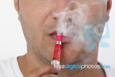 Man Smoking Electric Cigarette Stock Photo