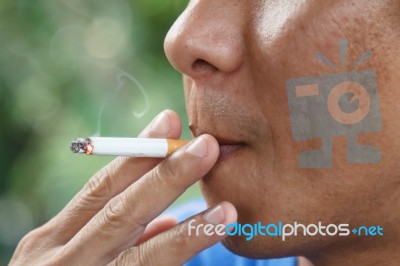 Man Smoking Tobacco Stock Photo