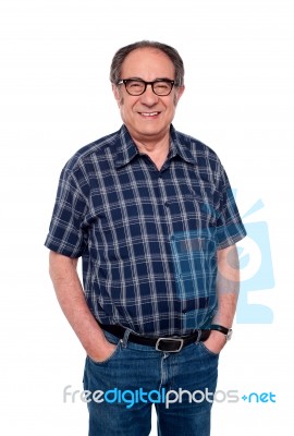 Man Standing With Hands In Pocket Stock Photo