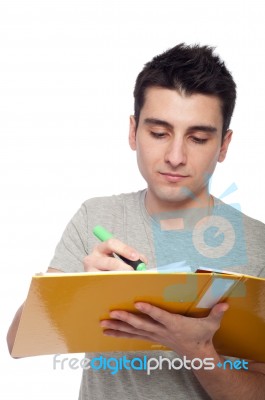 Man Studying With Dossier Stock Photo