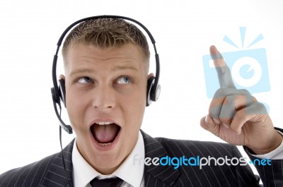 Man Surprised And Pointing Upwards Stock Photo