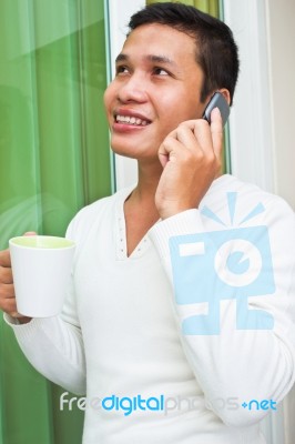 Man Talking Over Phone Stock Photo