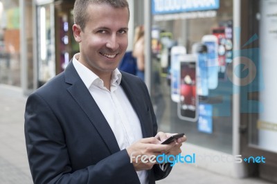 Man Typing Text Message Stock Photo