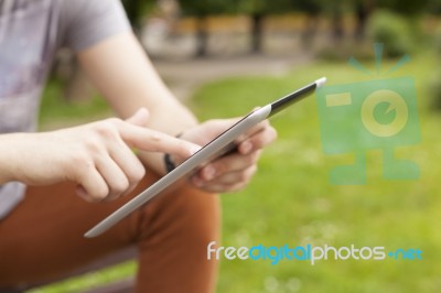 Man Use Tablet Reading News And Communicate On Social Networks Stock Photo