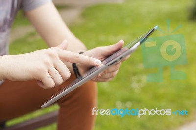 Man Use Tablet Reading News And Communicate On Social Networks Stock Photo