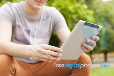 Man Use Tablet Reading News And Communicate On Social Networks Stock Photo