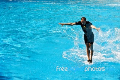 Man Walking On Water Stock Photo