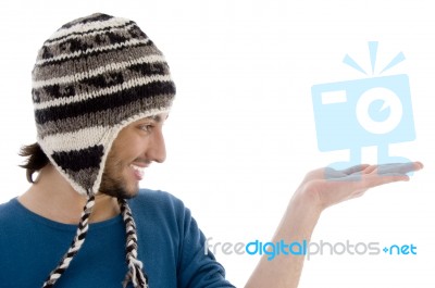 Man Wearing Cap With Open Palm Stock Photo